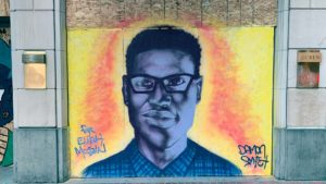 An art mural by Damon Smyth, in memoriam of Elijah McClain, a young Black man murdered by police.